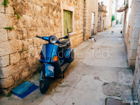 Bild på Retro Scooter for hipsters on the streets of Croatia and Montenegro A small malotrade moped